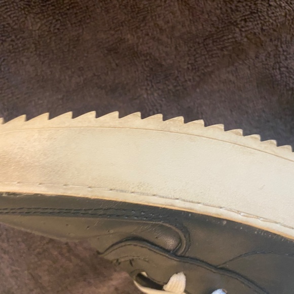 A pair of used sneakers. - Picture 4 of 7